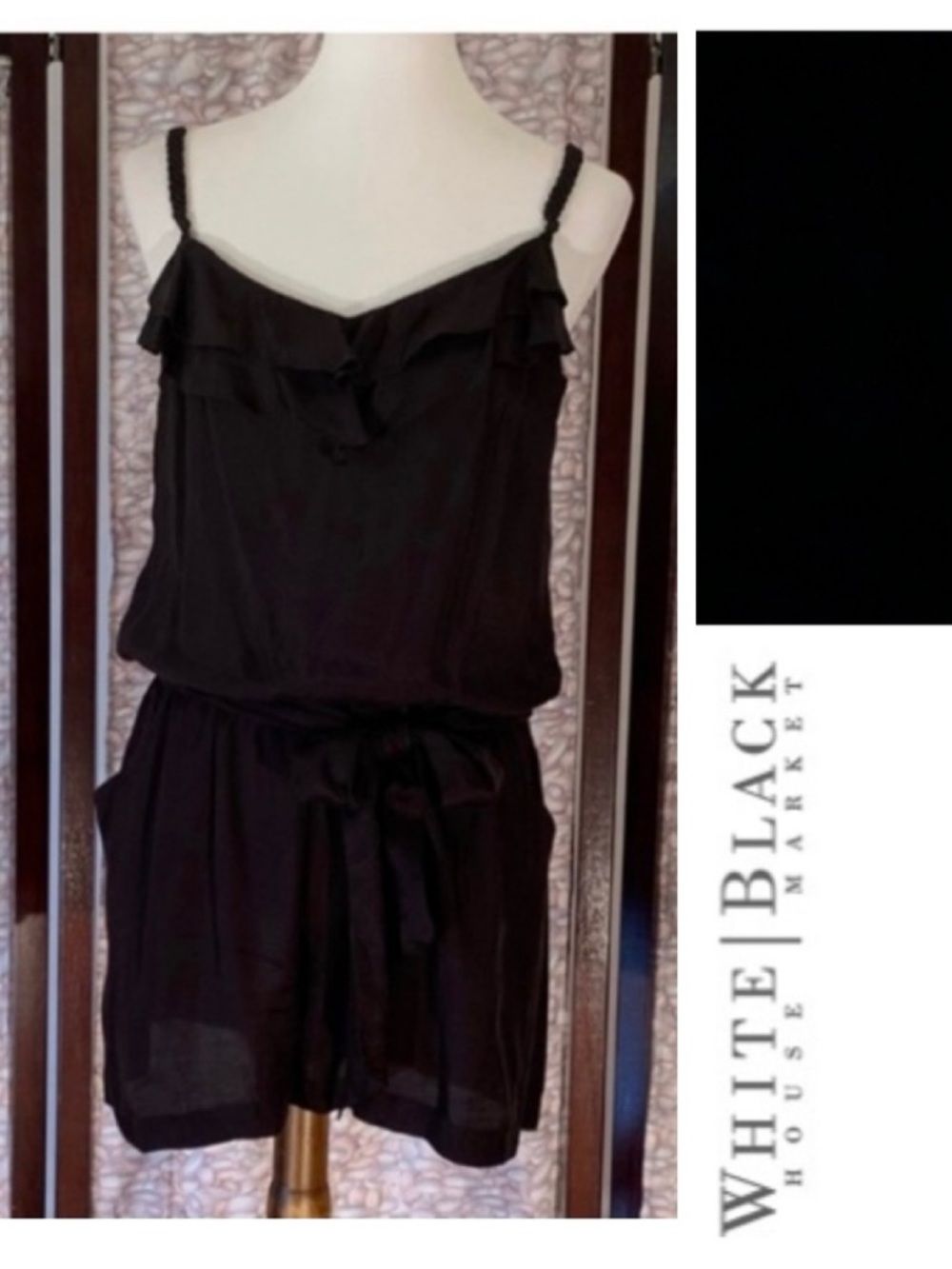 White House Black Market black romper with blousy top and belt.